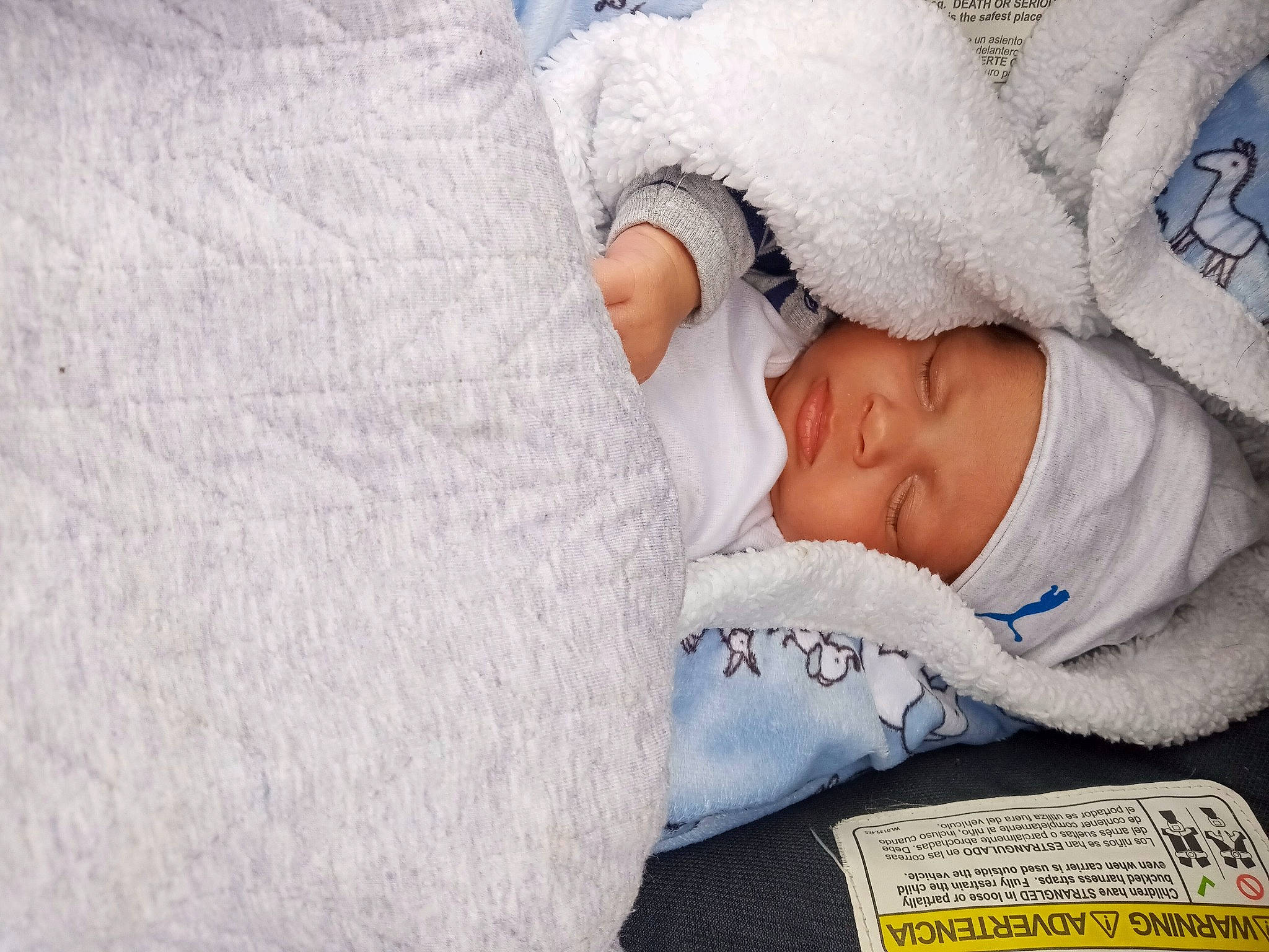 Jayden joined the competition — help win amazing prizes! arm, baby, baby_products, baby_sleeping, baby_toddler_clothing, beanie, bedding, bedtime, cap, child, comfort, eye, grey, headwear, human_body, knit_cap, linens, nap, person, sleeve