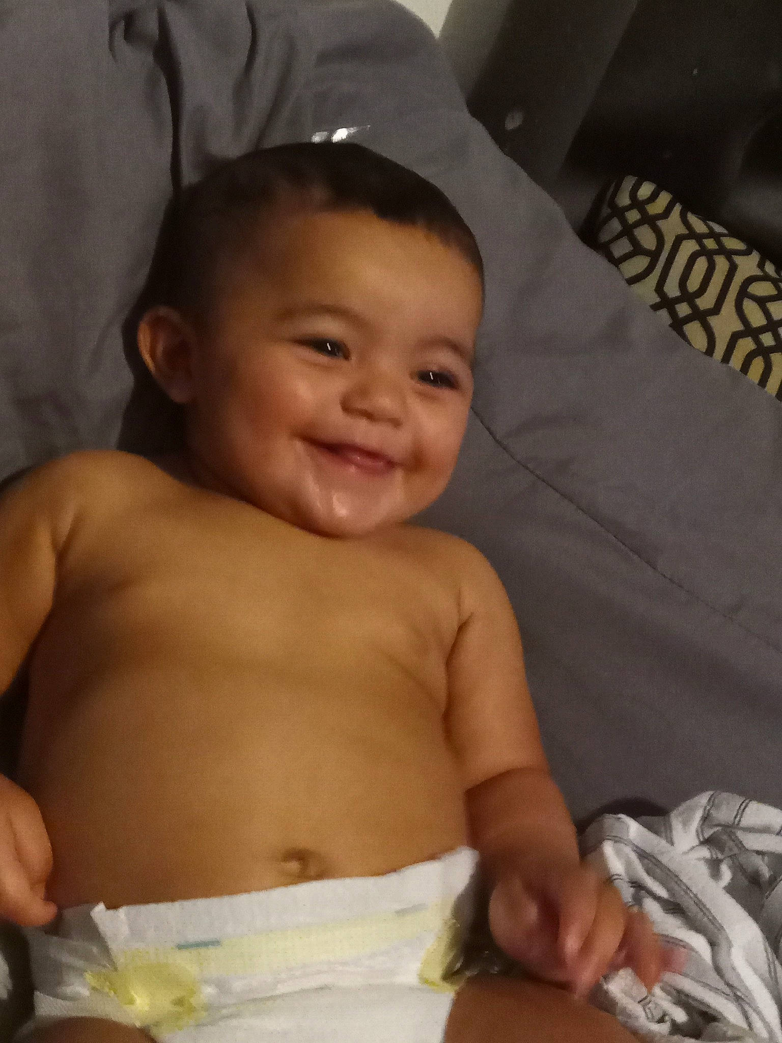 Isaiah is registered to the contest to win money with this photo: abdomen, arm, baby, baby_products, cheek, child, eye, face, facial_expression, head, joy, lip, mouth, muscle, nose, person, sitting, skin, smile, toddler