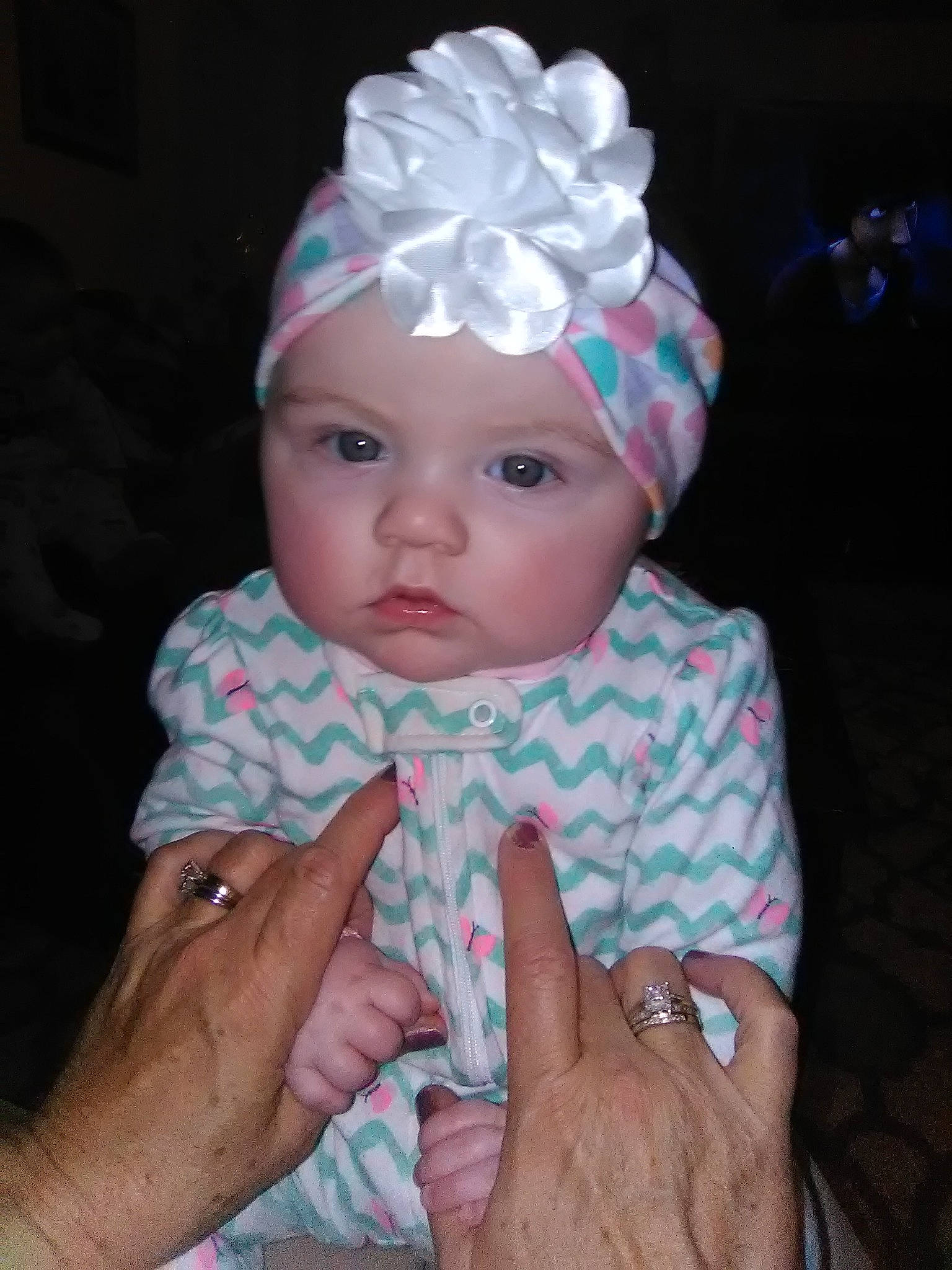 Serenity is registered to the contest to win money with this photo: beanie, bonnet, cap, cheek, child, girl, hair_accessory, head, headband, headgear, headpiece, headwear, infant, iris, person, pink, product, textile, toddler