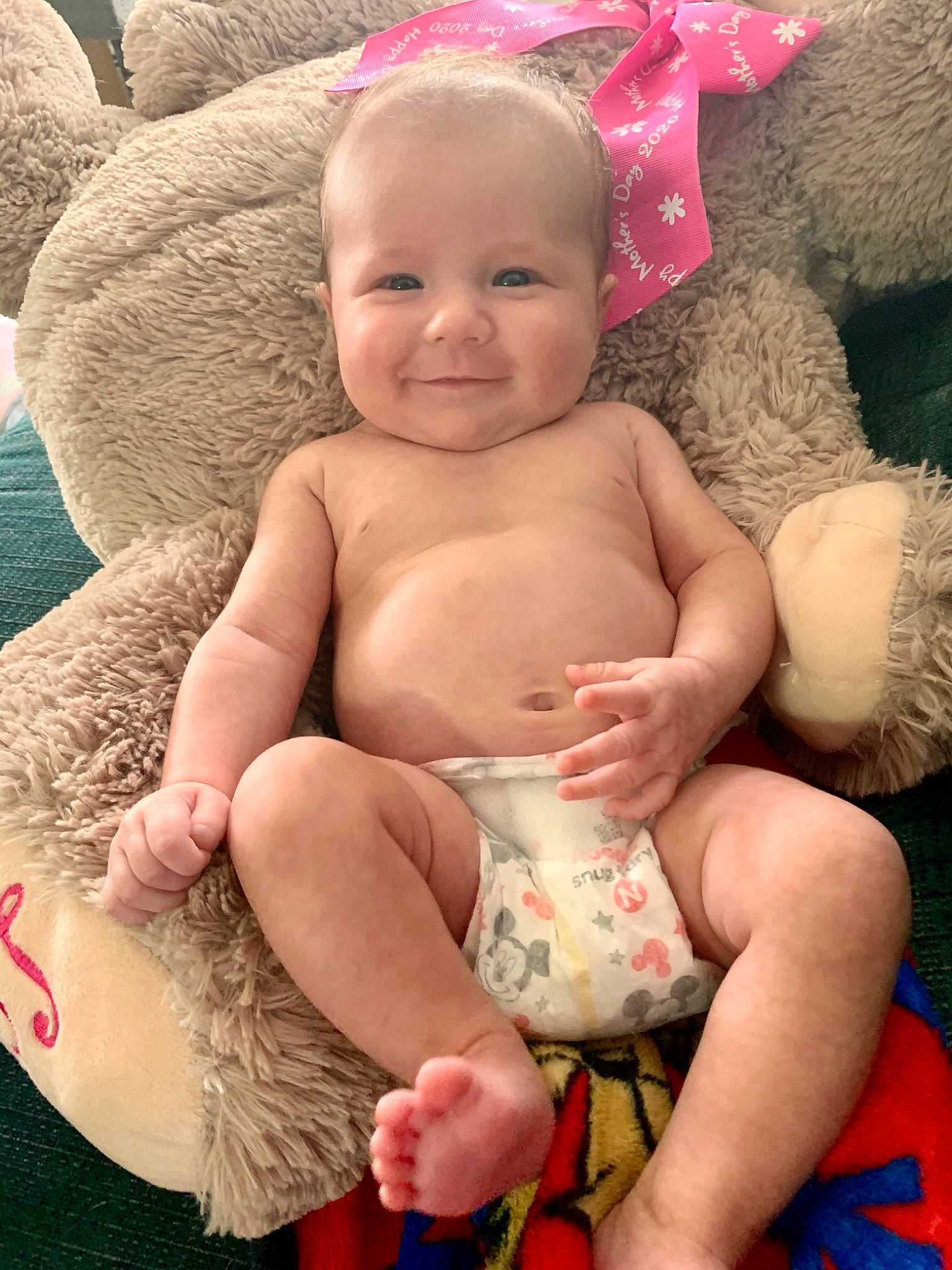 Lilyana is registered to the contest to win money with this photo: abdomen, baby, cheek, child, fur, joy, person, pink, play, sitting, skin, smile, toddler, trunk