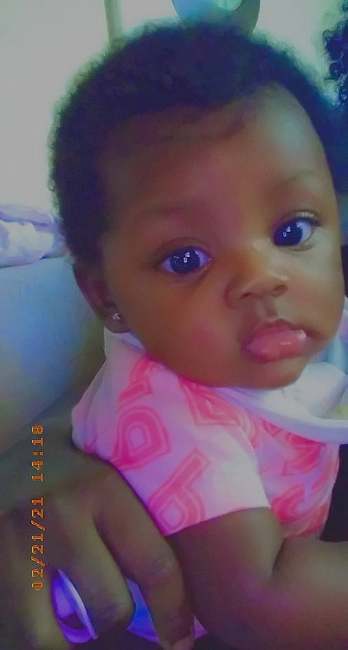 Kiley is registered to the contest to win money with this photo: baby, baby_toddler_clothing, black_hair, cheek, chest, child, eye, eyebrow, eyelash, forehead, fun, hair, happy, head, iris, lip, mouth, nose, person, skin