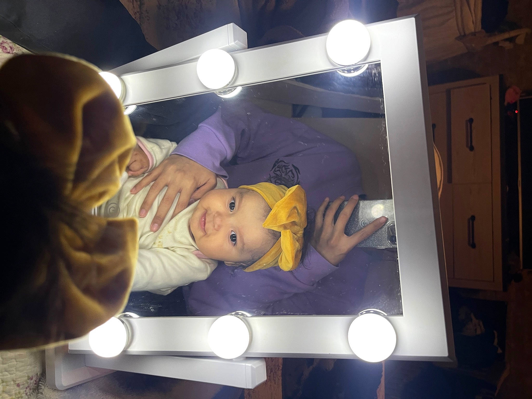 Isabella is registered to the contest to win money with this photo: animation, art, child, display_device, flash_photography, fun, hat, headwear, night, person, room, space, t_shirt