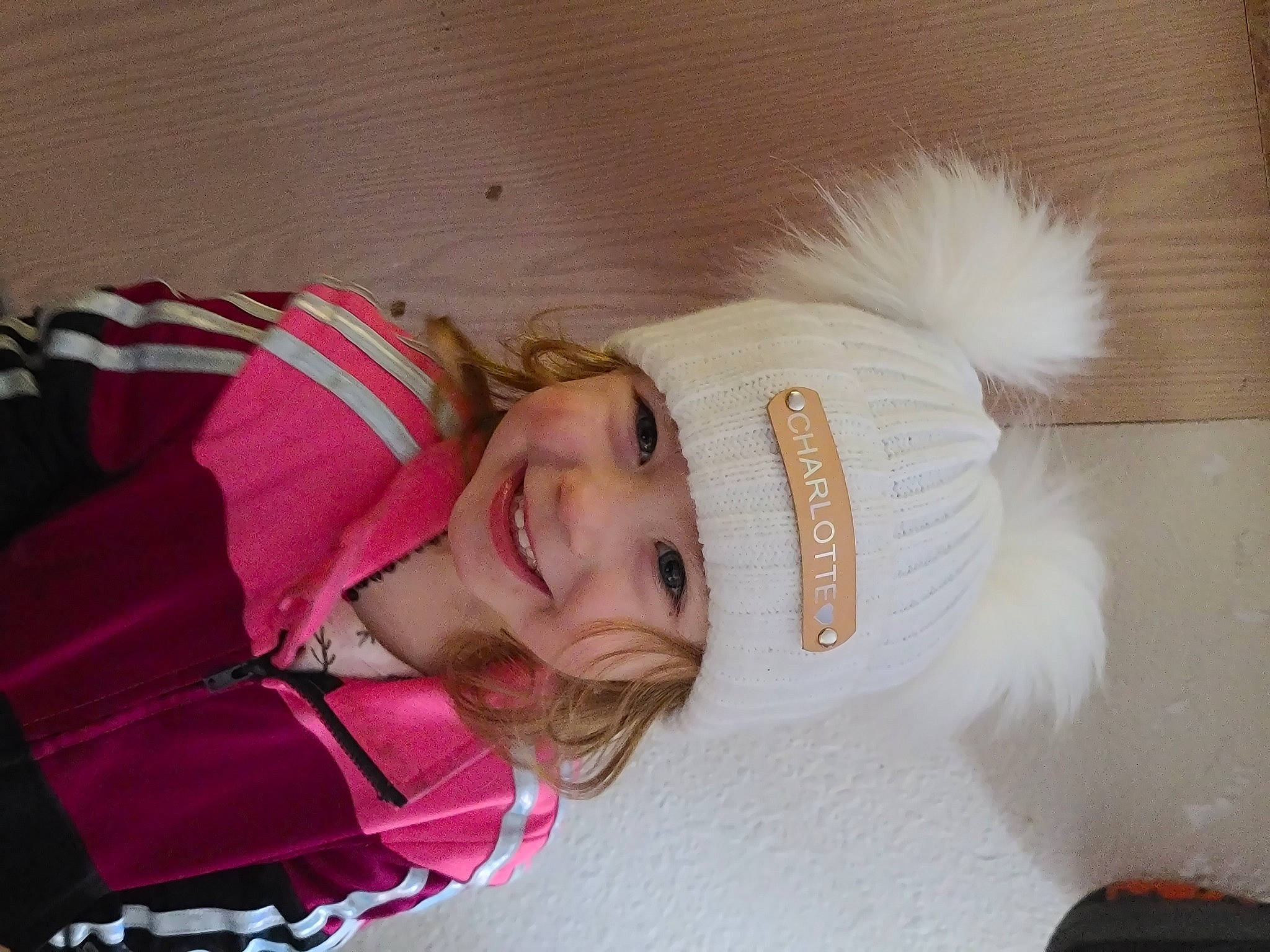 Harmony is registered to the contest to win money with this photo: child, comfort, fashion_accessory, fun, fur, happy, headwear, joy, magenta, person, smile, tree