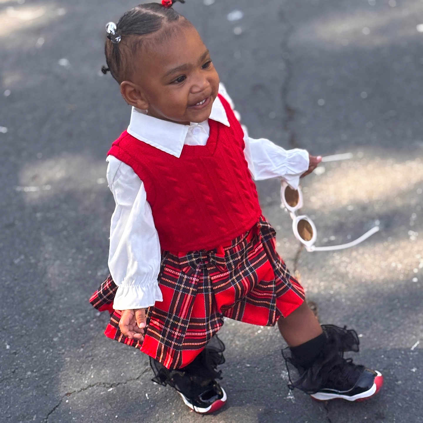 Nearri joined the competition — help win amazing prizes! black_hair, child, cute, daylight, fashion, hair_ponytails, happy, outdoor, pavement, person, plaid_skirt, red_sweater, smiling, sneakers, sunglasses, sunlight, toddler, walking, white_shirt, young_child
