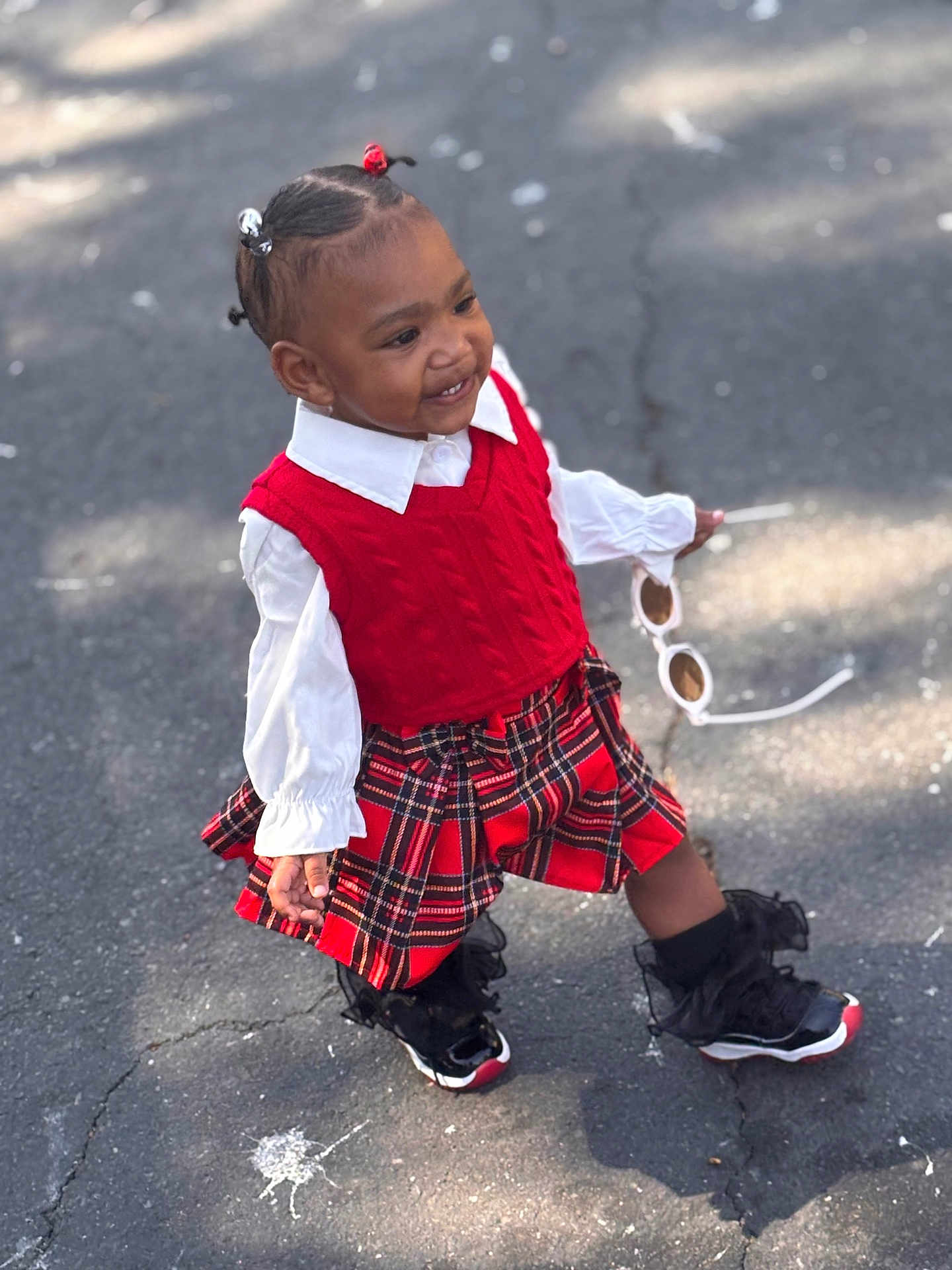 Nearri joined the competition — help win amazing prizes! black_hair, child, cute, daylight, fashion, hair_ponytails, happy, outdoor, pavement, person, plaid_skirt, red_sweater, smiling, sneakers, sunglasses, sunlight, toddler, walking, white_shirt, young_child