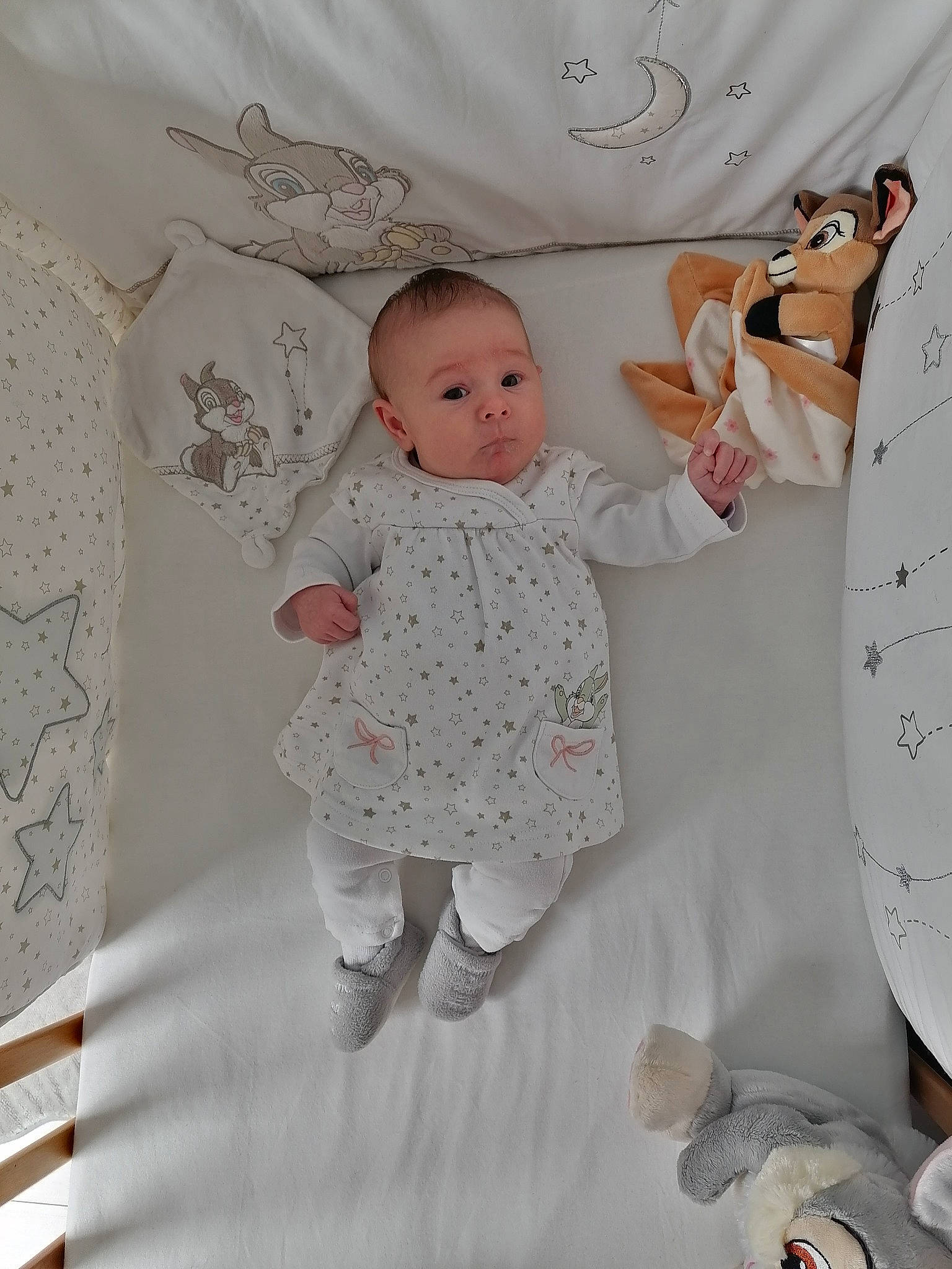 Rose participe au concours pour gagner de l'argent avec cette photo : arm, baby, baby_products, baby_toddler_clothing, child, comfort, grey, happy, linens, pattern, person, pink, product, room, sitting, skin, sleeve, t_shirt, textile, toddler