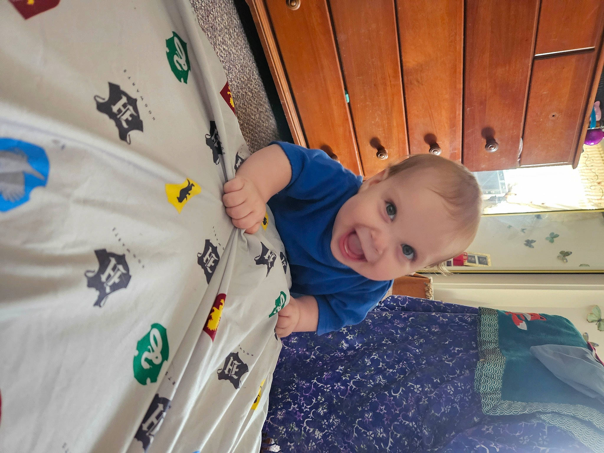 Jasper joined the competition — help win amazing prizes! baby, baby_products, baby_safety, baby_toddler_clothing, child, comfort, electric_blue, fun, happy, joy, leisure, linens, pattern, person, play, room, sleeve, smile, standing, t_shirt