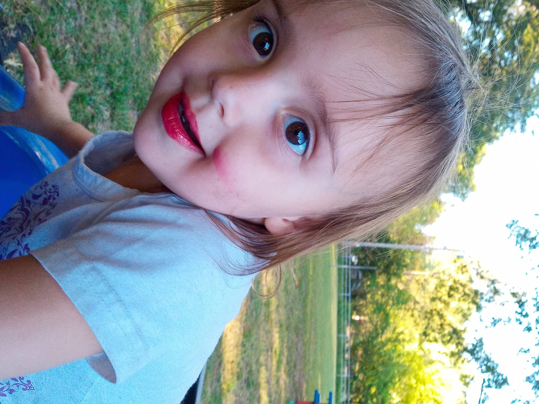 Aubriella is registered to the contest to win money with this photo: cheek, chin, eye, eyelash, face, facial_expression, happy, leaf, light, lip, mouth, nose, organ, people_in_nature, person, photograph, plant, skin, smile, tree