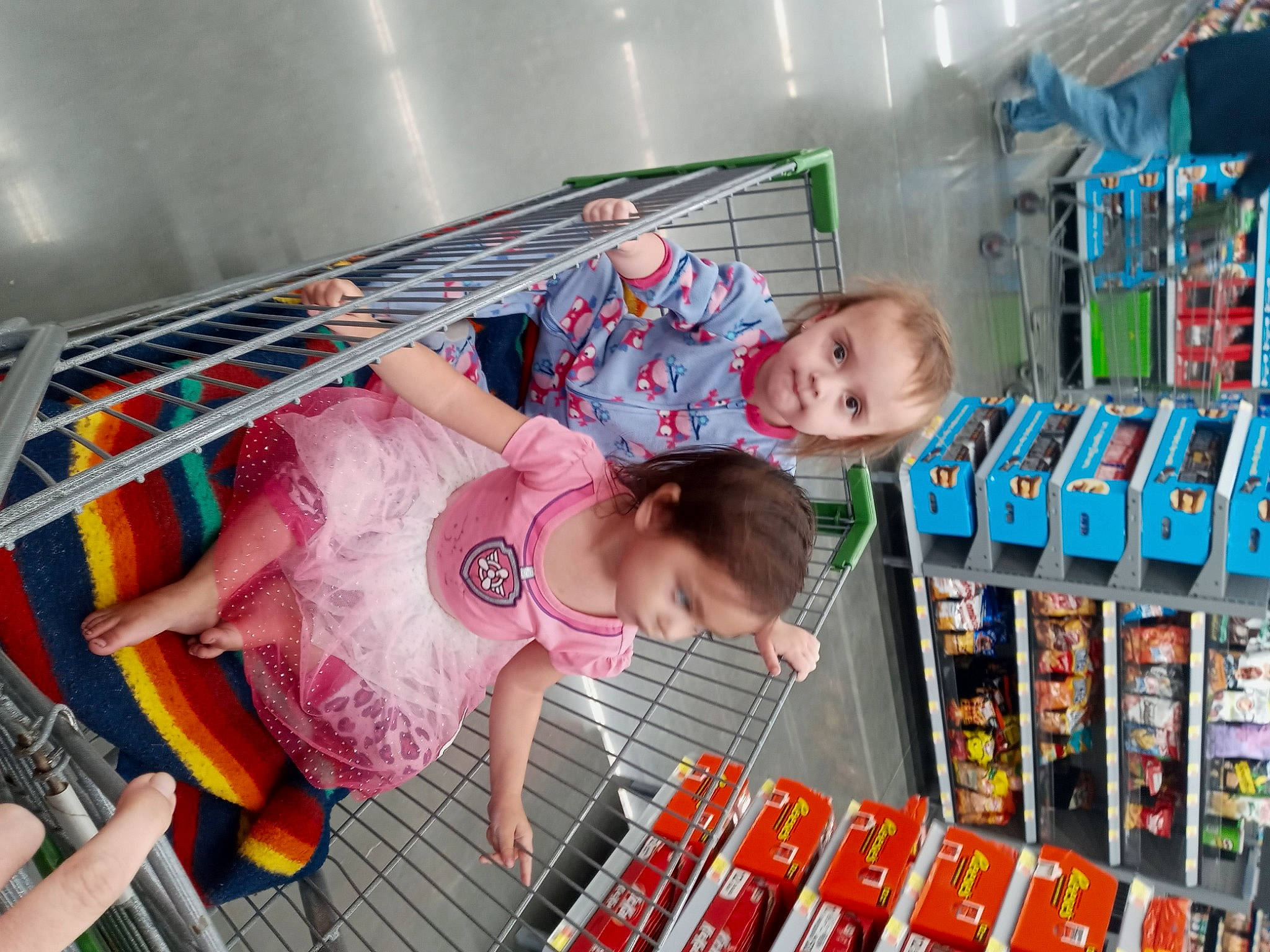 Aubriella is registered to the contest to win money with this photo: baby, baby_toddler_clothing, building, child, convenience_store, customer, fun, leisure, people, person, photograph, play, product, publication, retail, room, shelf, shelving, snapshot, t_shirt