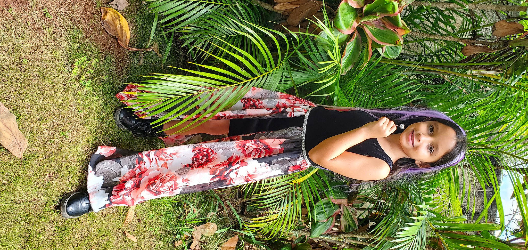 Aliyana is registered to the contest to win money with this photo: arecales, botany, event, garden, grass, green, joy, leaf, leisure, nature, organism, palm_tree, people_in_nature, person, plant, smile, terrestrial_plant, thigh, tree, trunk