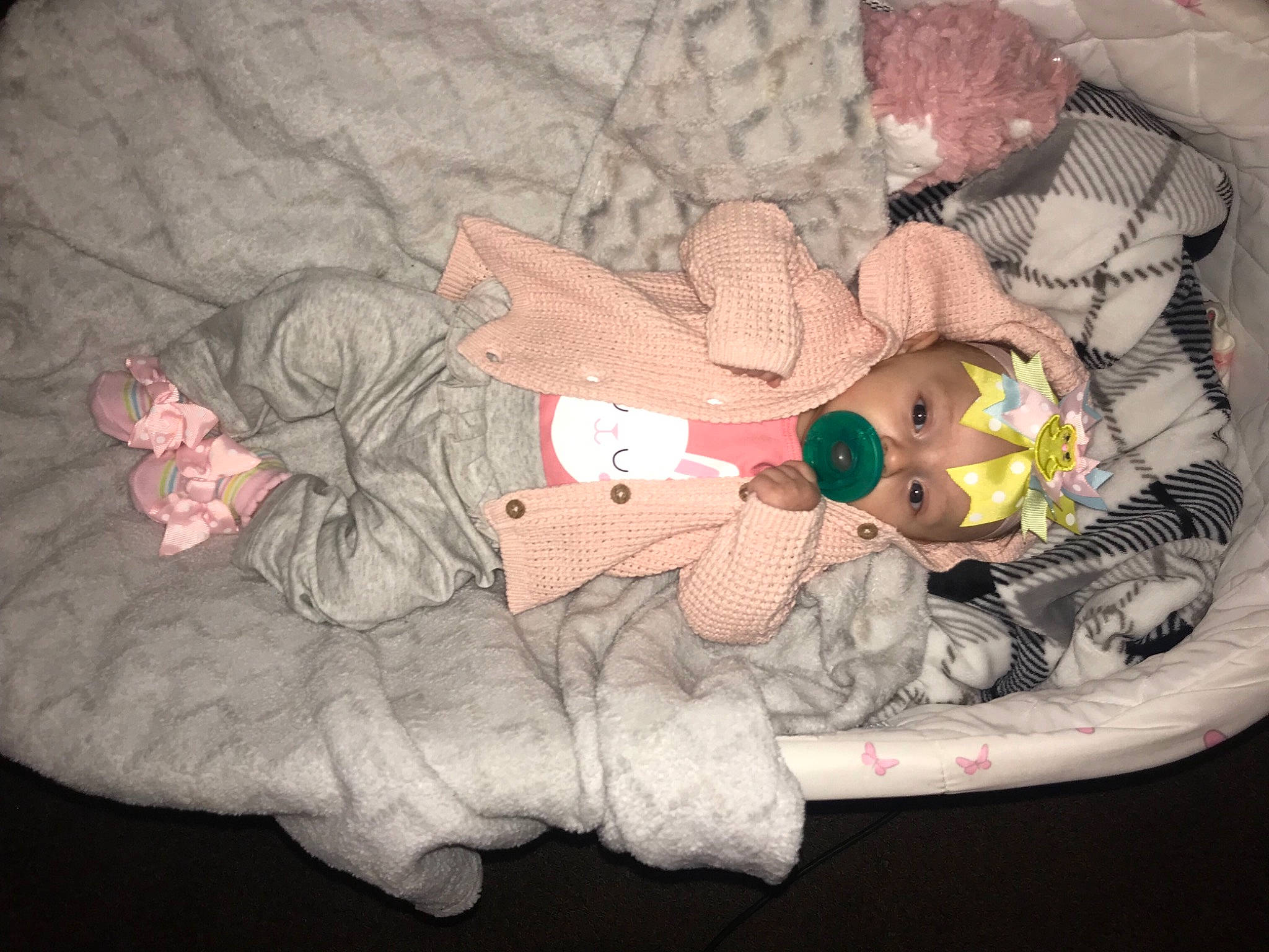 Elliana is registered to the contest to win money with this photo: art, baby, baby_products, baby_toddler_clothing, baby_toys, carmine, child, comfort, fictional_character, finger, hand, headgear, headwear, linens, pattern, person, plush, room, stuffed_toy, toddler