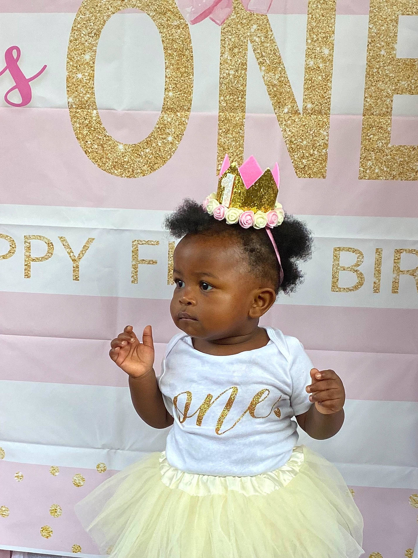 Jolie is registered to the contest to win money with this photo: baby_toddler_clothing, beauty, dress, event, face, facial_expression, fashion, fashion_design, hairstyle, happy, head, jewellery, magenta, person, pink, ruffle, skin, sleeve, toddler, white