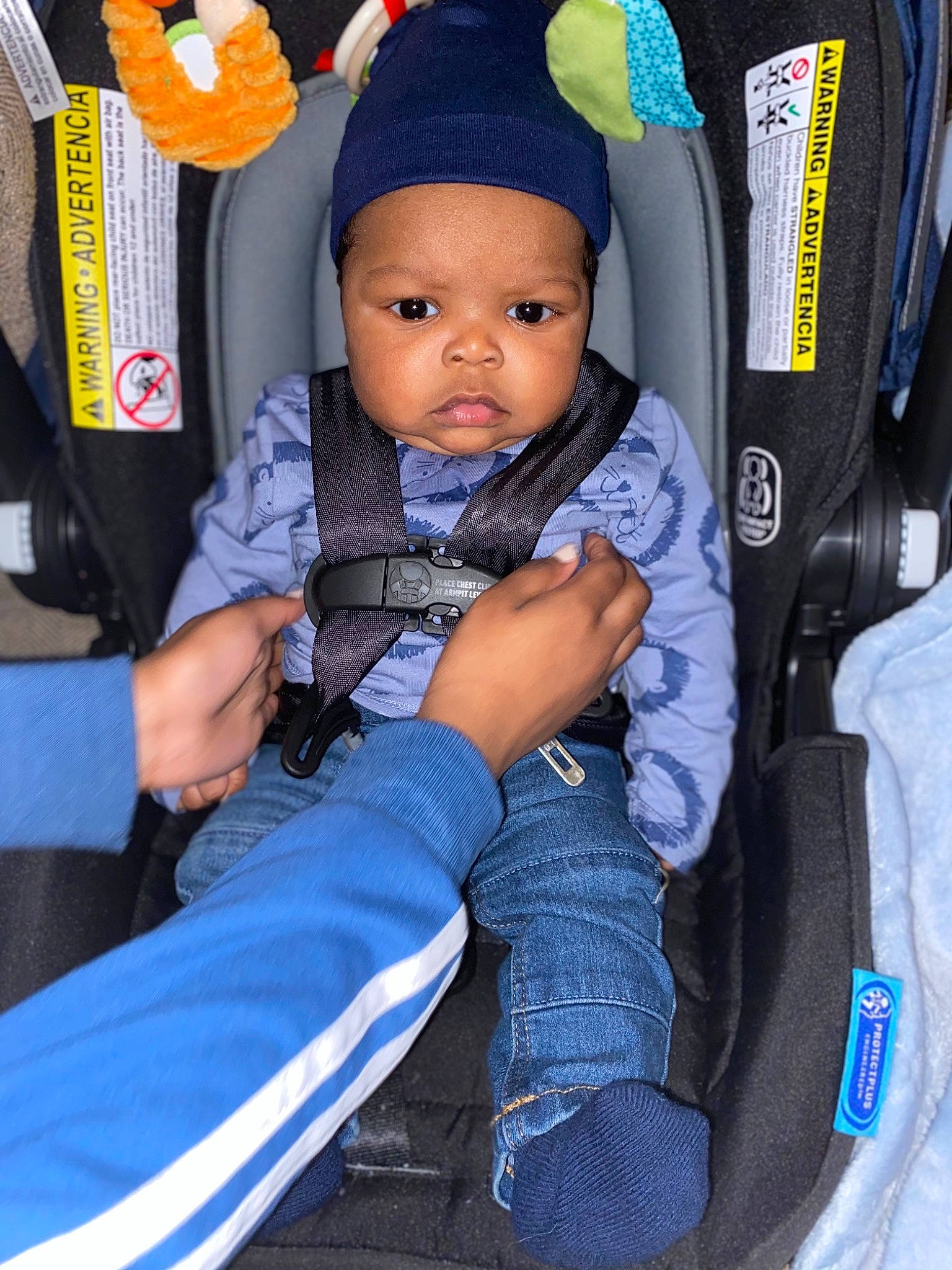 Jalen is registered to the contest to win money with this photo: auto_part, baby, baby_carriage, baby_in_car_seat, baby_products, baby_toddler_clothing, bag, cap, car_seat, car_seat_cover, child, comfort, electric_blue, fashion_accessory, fun, headwear, leisure, person, sitting, toddler