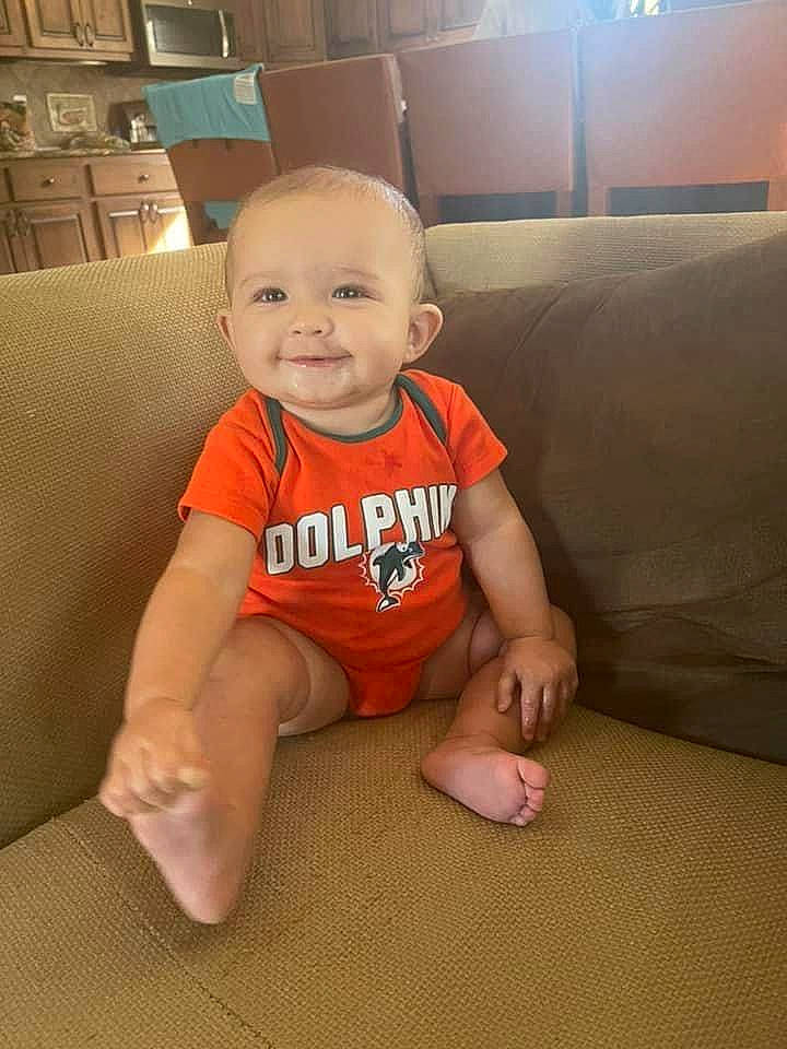 Quinn joined the competition — help win amazing prizes! baby, baby_toddler_clothing, cabinetry, cheek, clothing, comfort, couch, eye, floor, flooring, foot, happy, head, human_leg, joy, mouth, person, skin, sleeve, smile