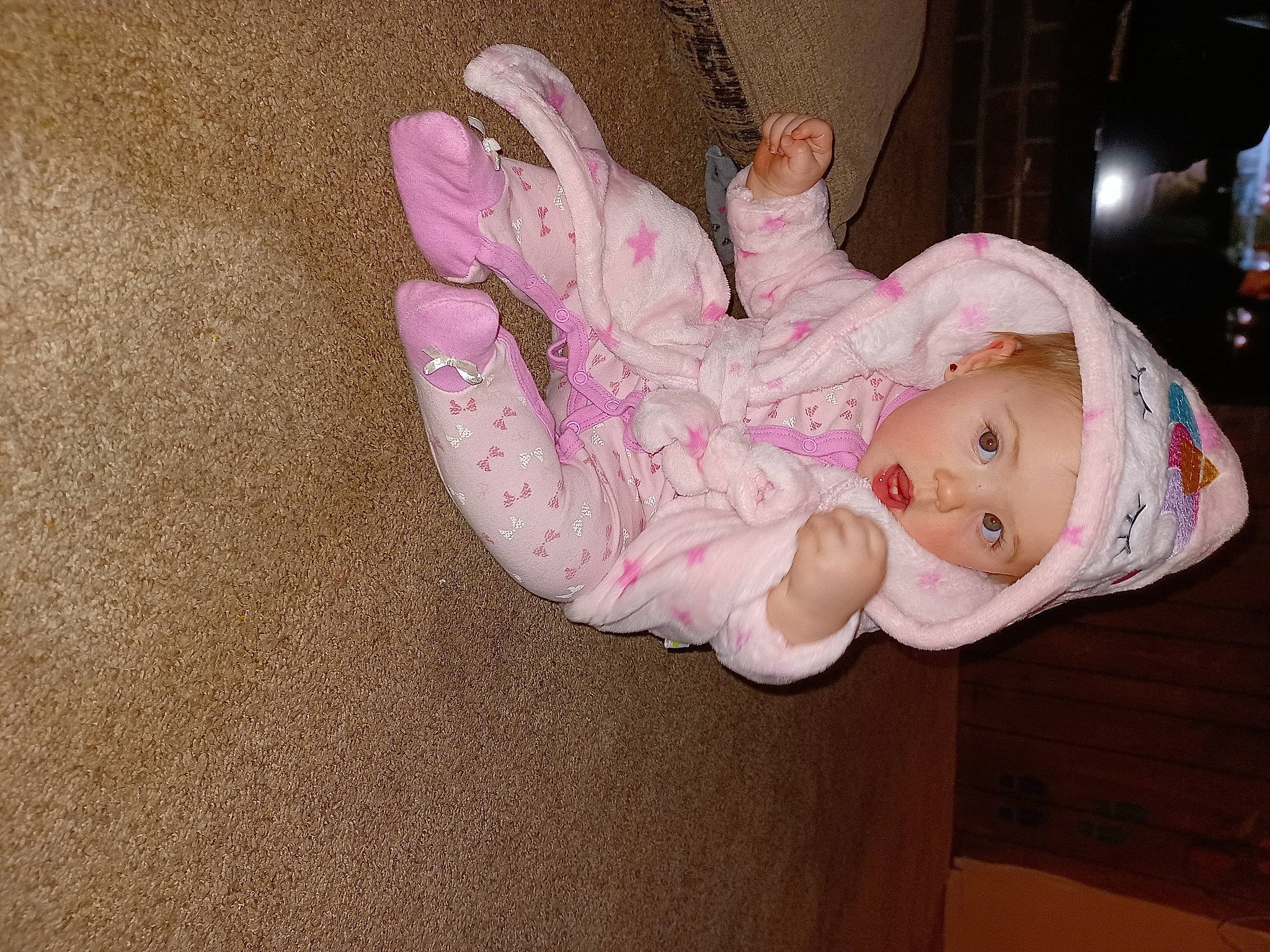 Skylar joined the competition — help win amazing prizes! baby, baby_products, baby_toddler_clothing, cheek, child, comfort, event, fun, happy, hat, lap, person, pink, room, sitting, sleeve, surprise, toddler, wood