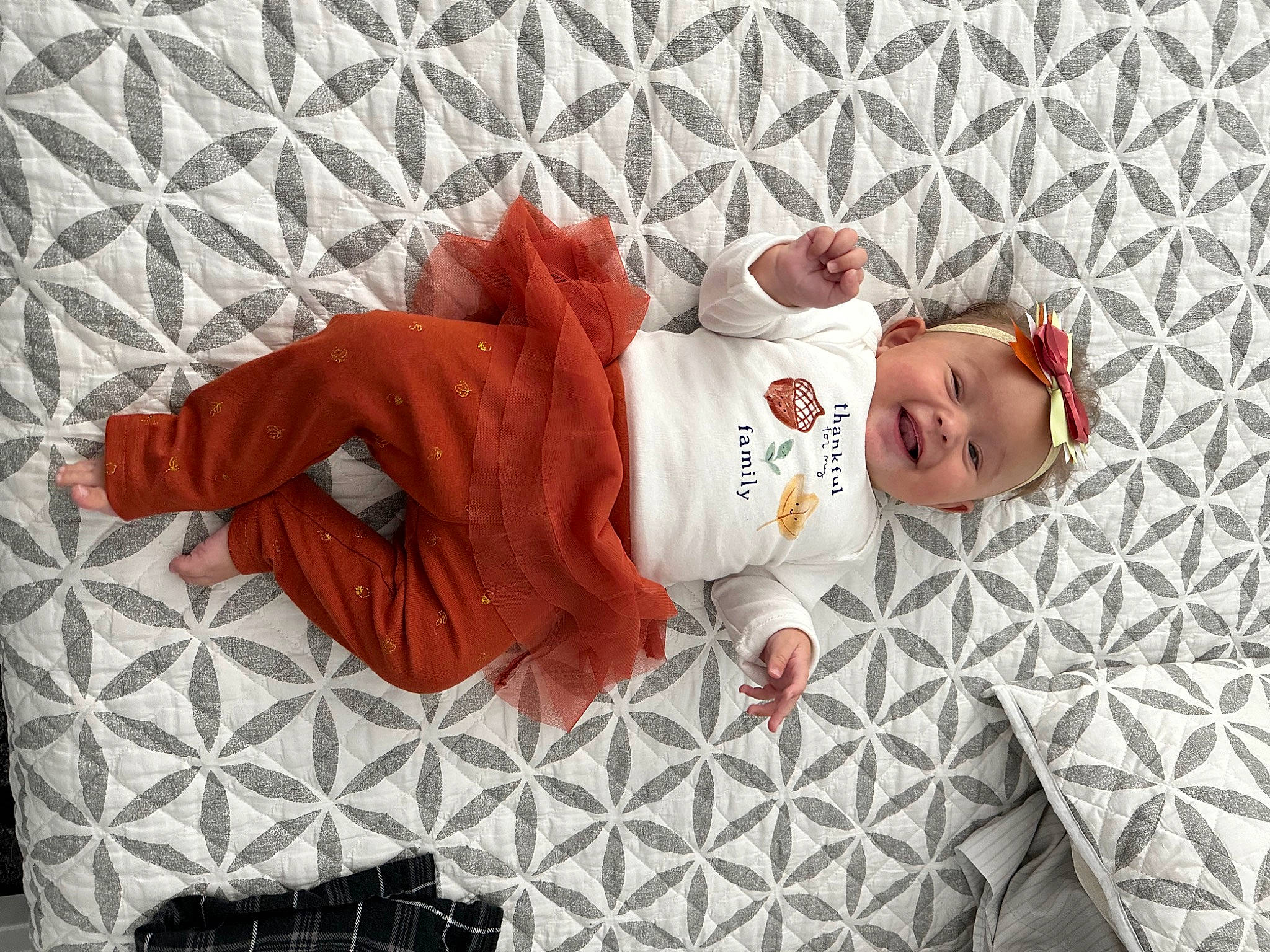 Dayton joined the competition — help win amazing prizes! baby, baby_products, baby_safety, baby_toddler_clothing, carmine, child, comfort, happy, headwear, linens, orange, pattern, person, room, sleeve, smile, sock, textile, toddler