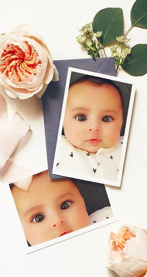Norah participe au concours pour gagner de l'argent avec cette photo : art, baby, child, fashion_accessory, flower, hair_accessory, peach, person, plant, toddler