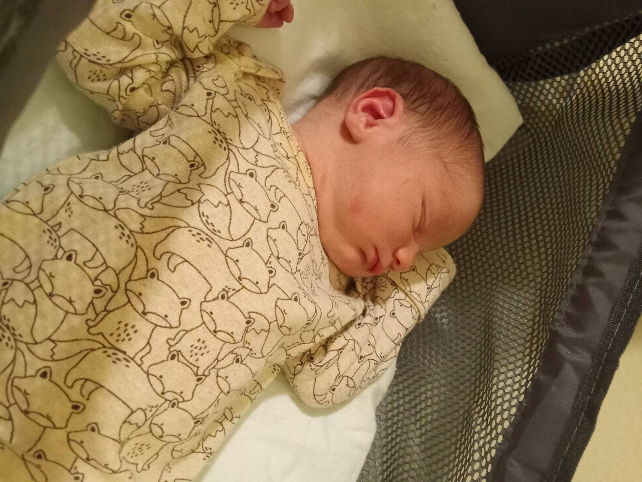 Hugh is registered to the contest to win money with this photo: baby, baby_products, baby_safety, baby_sleeping, baby_toddler_clothing, bedtime, child, comfort, hat, linens, nap, pattern, person, room, sleep, sleeve, textile, toddler