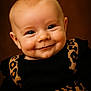 Line joined the competition — help win amazing prizes! baby, background, black_top, cheeks, child, clothing, cute, eyes, face, happy, head, infant, leopard_print, person, portrait, skin, smile, studio, warm_colors, young