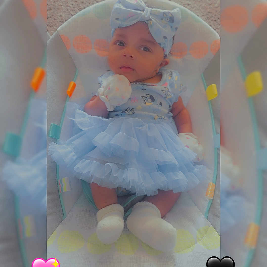 Na'Rayah joined the competition — help win amazing prizes! baby, bed, bonnet, clothing, cradle, crib, dress, face, furniture, glove, hat, head, hosiery, infantbed, newborn, person, photography, portrait, sock, toy