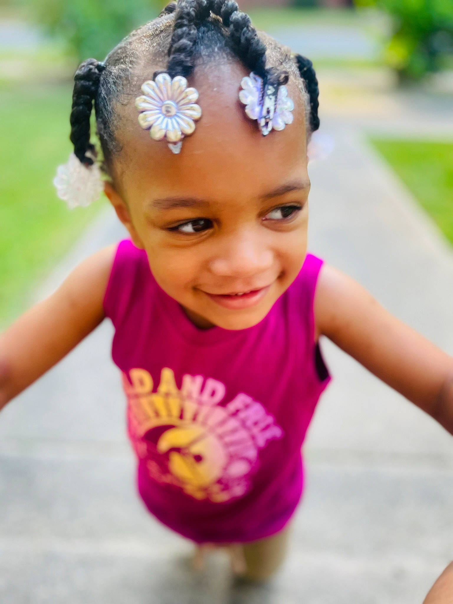 Autumn is registered to the contest to win money with this photo: baby_toddler_clothing, black_hair, child, chin, eye, fun, grass, happy, headband, headpiece, headwear, jewellery, joy, lip, magenta, neck, people, person, pink, sleeve