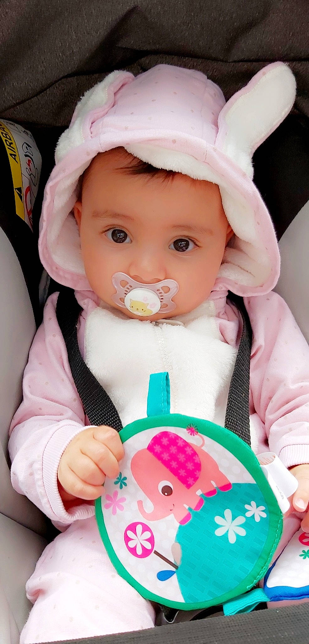 Mia participe au concours pour gagner de l'argent avec cette photo : baby, baby_toddler_clothing, blue, cheek, child, clothing, doll, dress, eyelash, green, happy, person, pink, product, skin, sleeve, sweetness, textile, toddler, toy