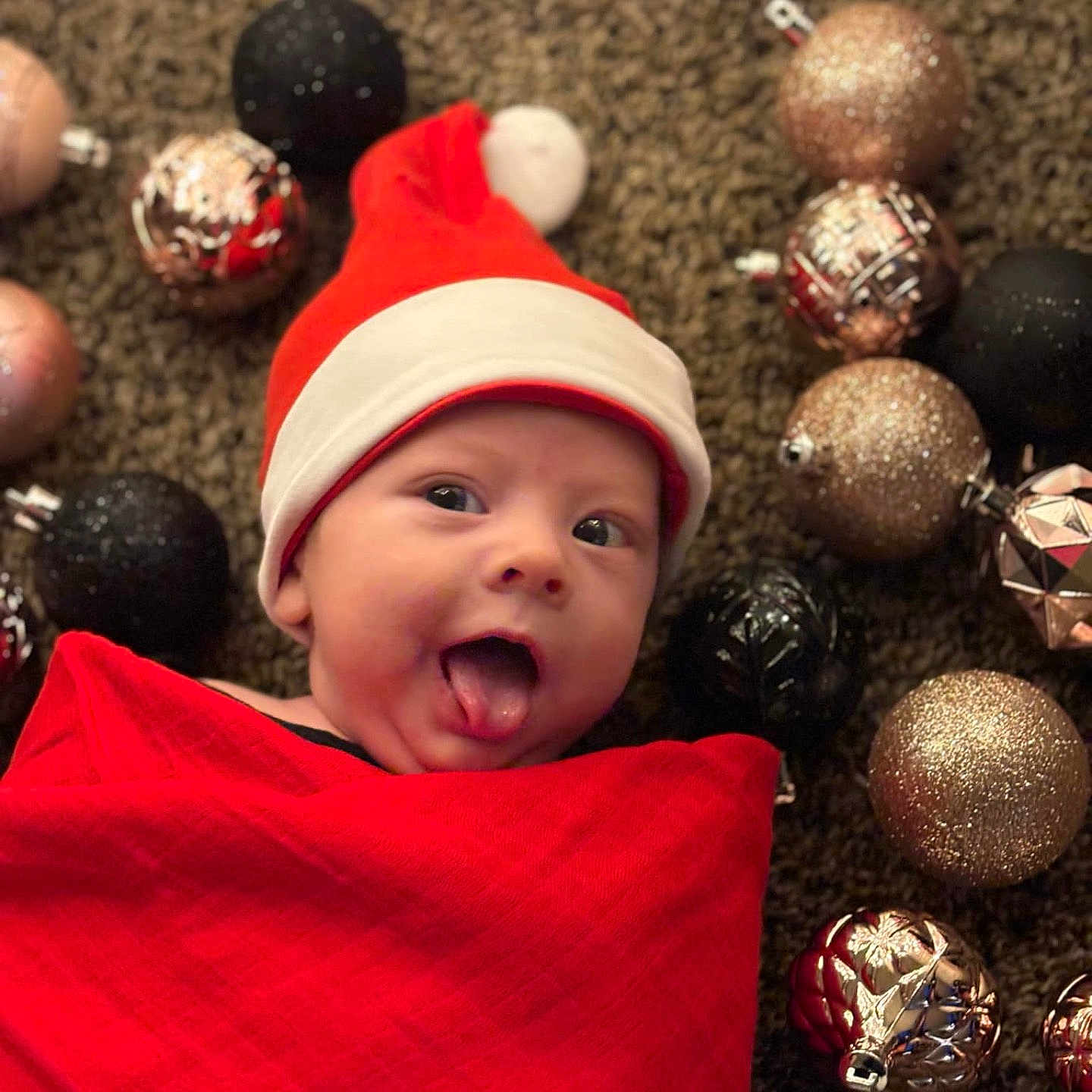 Kalen is registered to the contest to win money with this photo: accessories, ammunition, baby, ball, cap, clothing, face, football, grenade, happy, hat, head, person, photography, portrait, smile, soccer, soccerball, sport, weapon