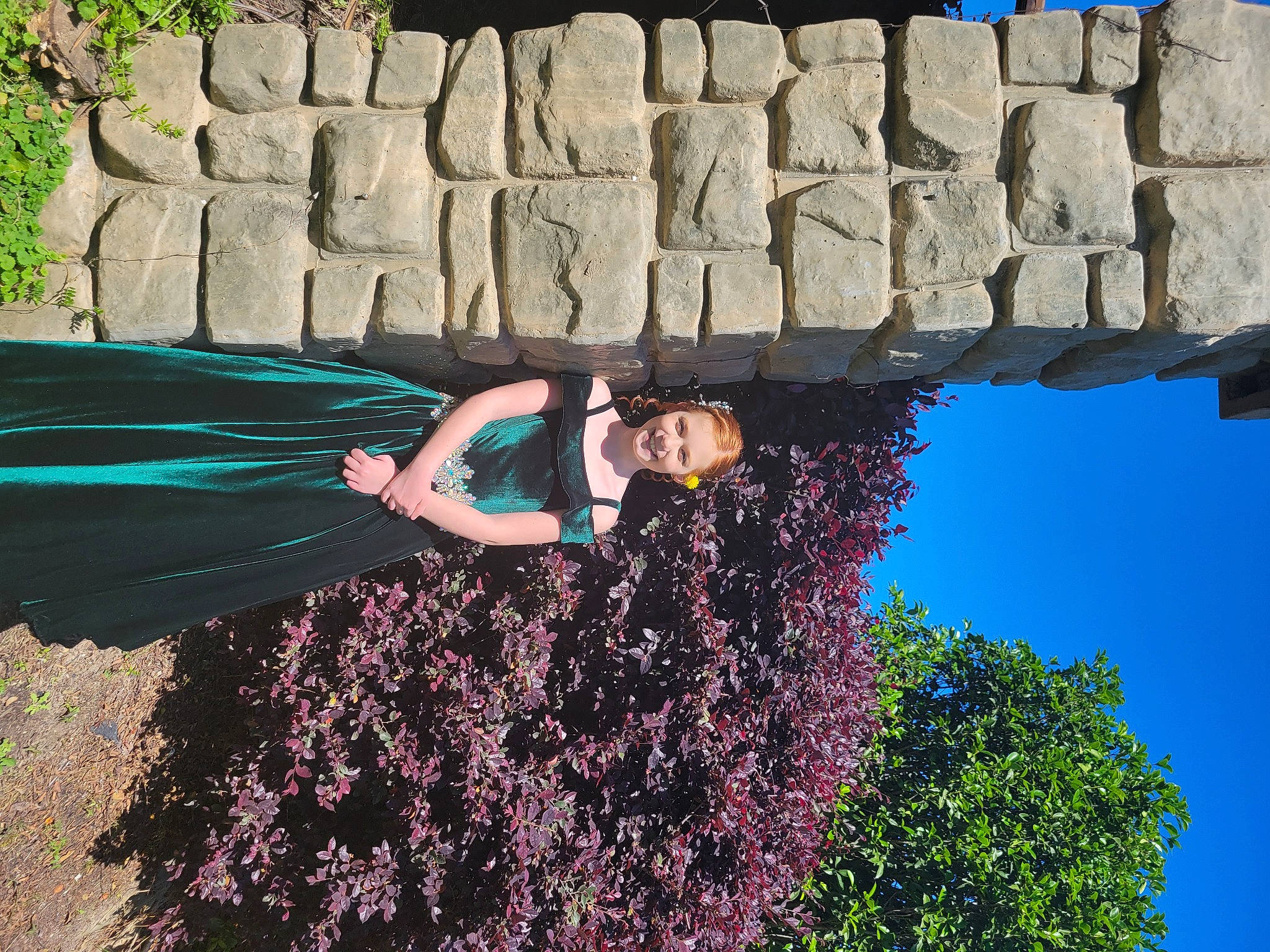 Claire is registered to the contest to win money with this photo: fun, garden, grass, green, happy, joy, landscape, leisure, people_in_nature, person, plant, recreation, rock, shadow, shrub, sky, soil, spring, t_shirt, tints_and_shades