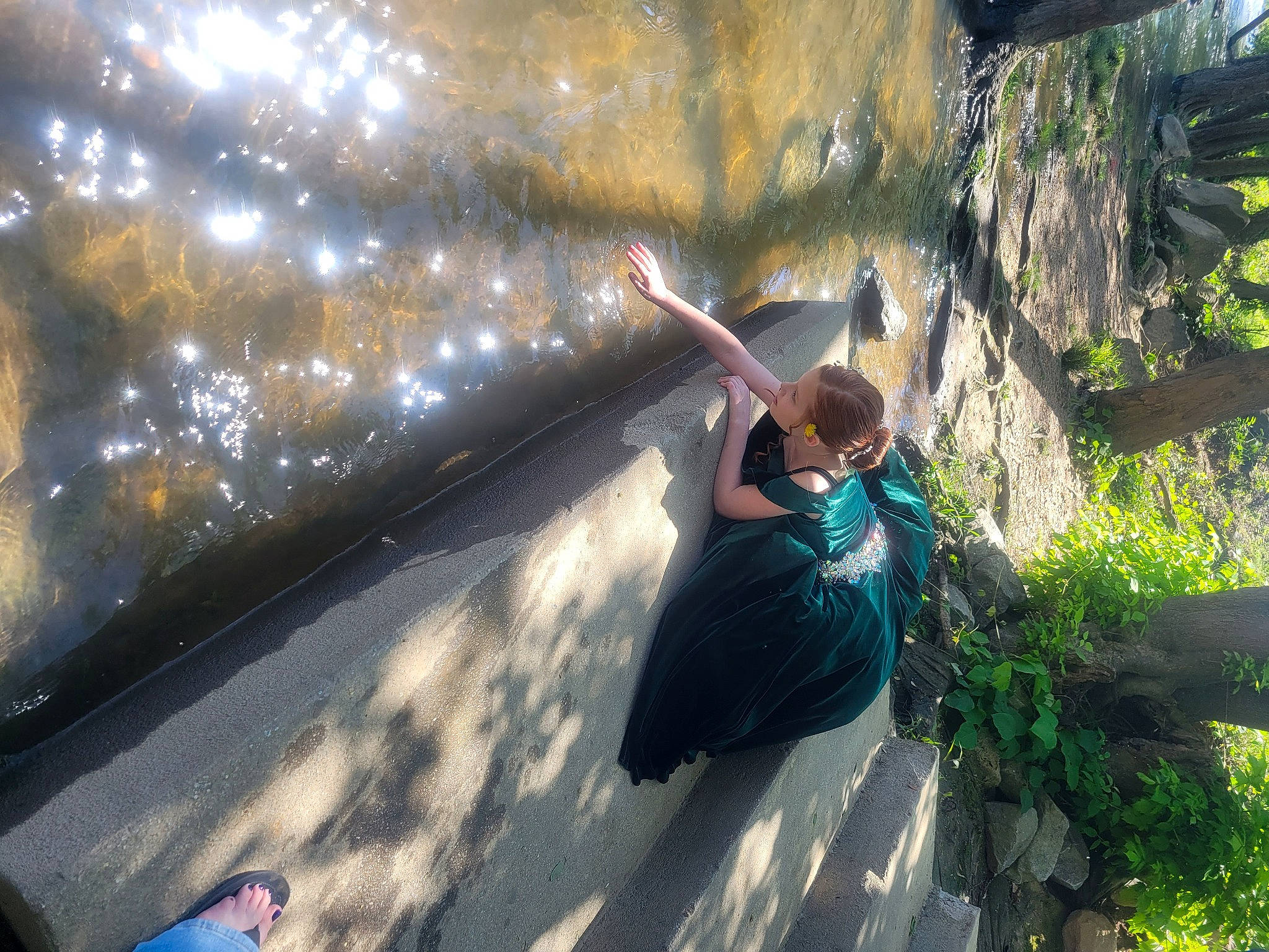 Claire is registered to the contest to win money with this photo: adventure, asphalt, cool, extreme_sport, forest, fun, happy, landscape, leisure, people_in_nature, person, plant, recreation, rock, shadow, sitting, snapshot, sport_climbing, sunlight, tints_and_shades