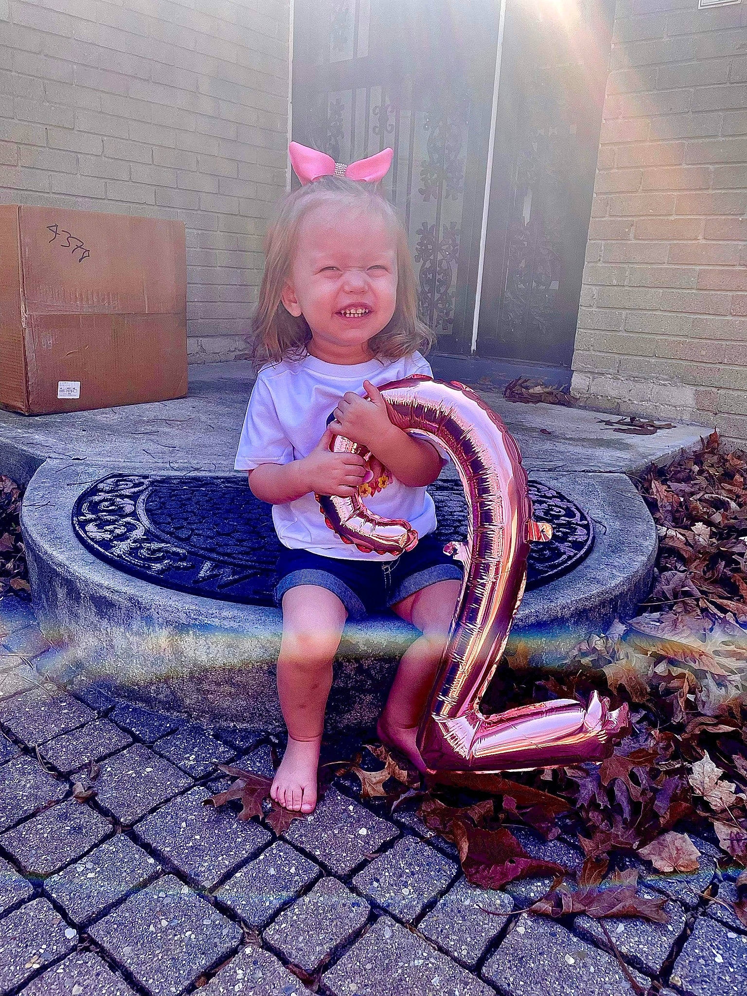 Letty joined the competition — help win amazing prizes! automotive_tire, baby_toddler_clothing, child, face, flash_photography, fun, grass, happy, head, human_body, human_leg, leisure, magenta, person, pink, purple, sandal, shoe, sitting, smile