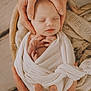 baby, newborn, hands, swaddle, blanket, basket, sleeping, infant, peaceful, soft, cute, closeup, human, parental_care, skin, fingers, gentle, portrait, rest, warm