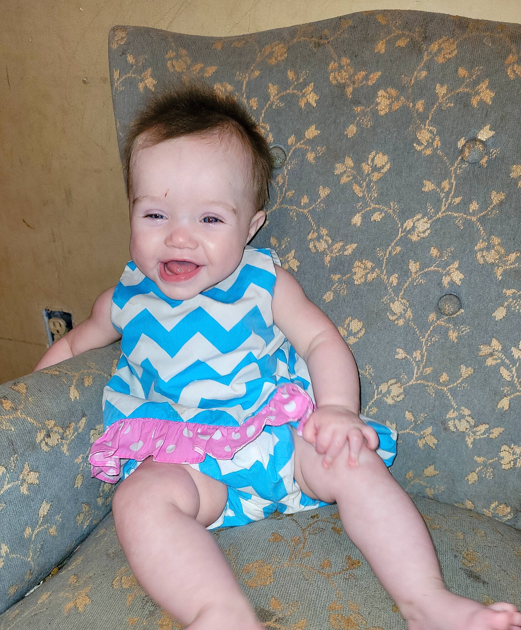 Elizabeth is registered to the contest to win money with this photo: aqua, azure, baby_toddler_clothing, cheek, comfort, eye, facial_expression, finger, hairstyle, head, iris, person, pink, product, purple, skin, sleeve, smile, standing, textile