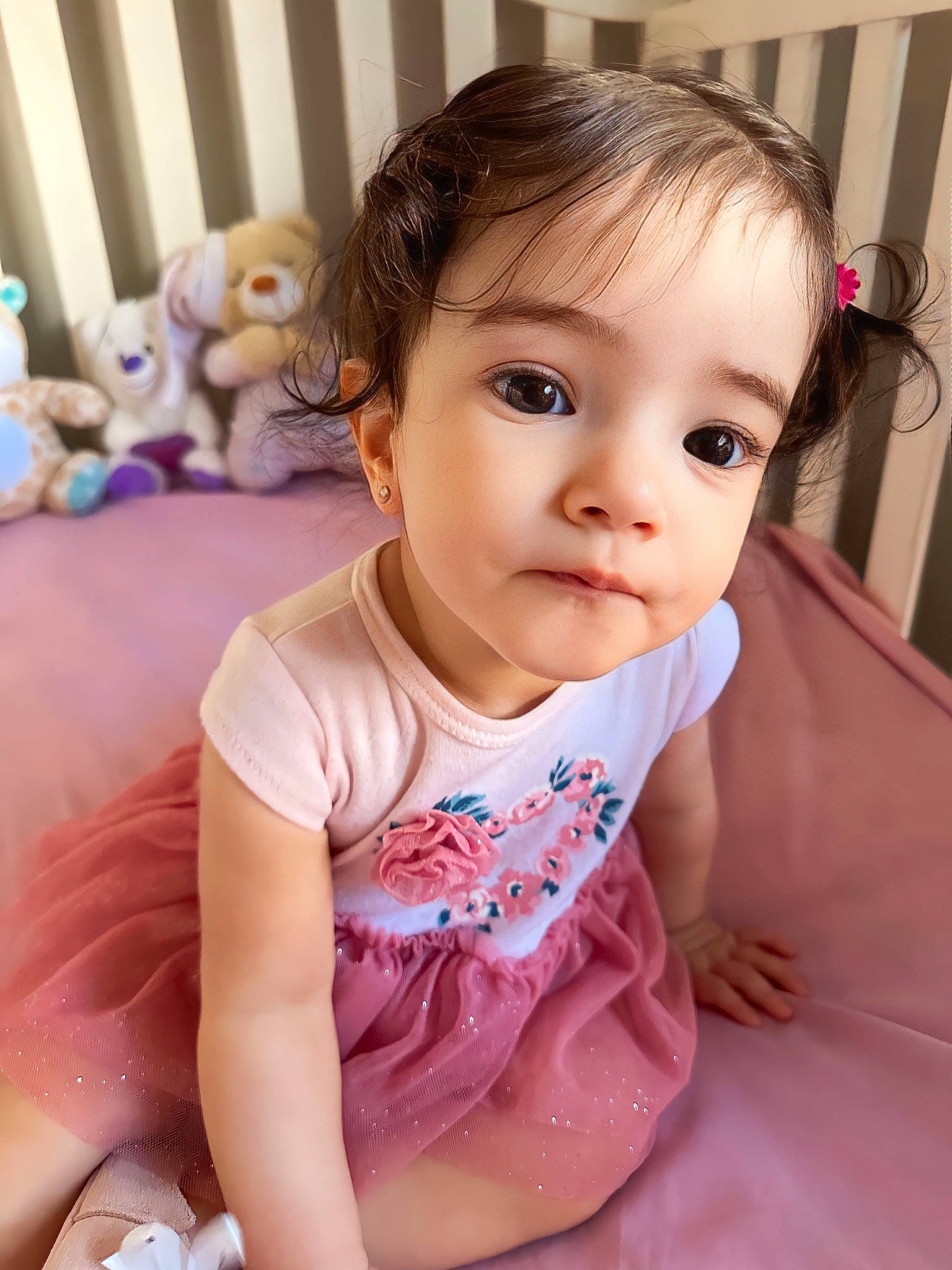 Miranda is registered to the contest to win money with this photo: baby, baby_toddler_clothing, cheek, child, comfort, dress, eye, eyelash, fun, hair, happy, iris, mammal, neck, nose, person, pink, skin, sleeve, toddler
