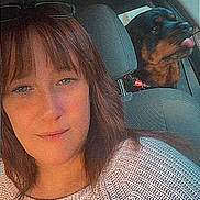 Freedom joined the competition — help win amazing prizes! backseat, brown_hair, candid, car, companion, dog, face, glasses, happy, indoor, pet, portrait, seatbelt, selfie, sweater, tongue, travel, vehicle, window, woman