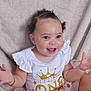 Alayna joined the competition — help win amazing prizes! baby, child, smiling, happy, blue_eyes, curly_hair, white_shirt, gold_crown, tutu, pink_skirt, earrings, bracelet, sitting, blanket, cute, portrait, indoor, infant, joyful, closeup