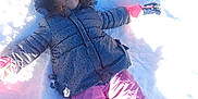 Dalyah a rejoint le concours — aidez-le/la à gagner de superbes lots ! boots, child, cold, fun, gloves, happy, jacket, nature, outdoor, park, pink_pants, play, recreation, smiling, snow, snow_angel, snowy_ground, sunlight, winter, winter_clothing