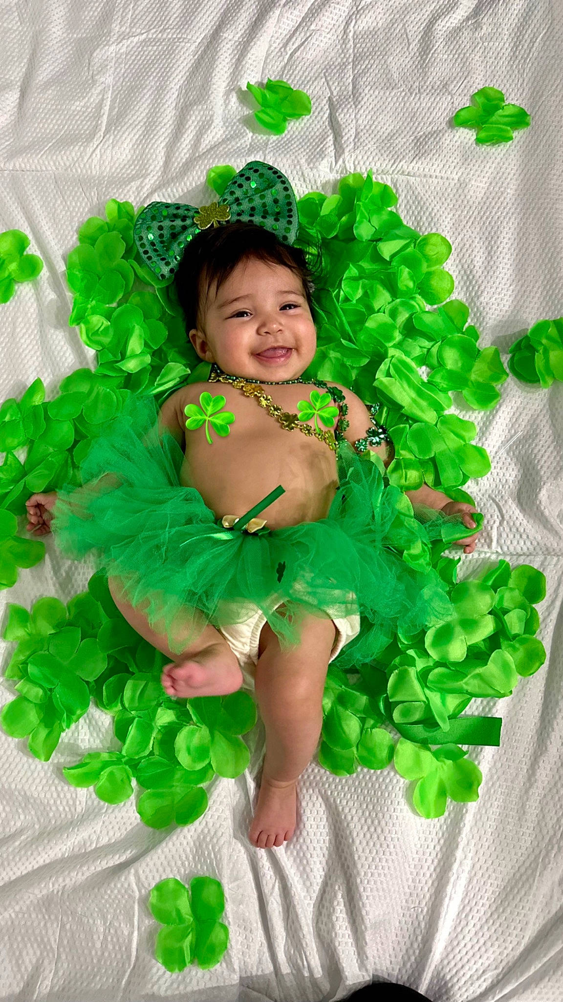 Ella is registered to the contest to win money with this photo: baby_toddler_clothing, child, costume, dance, event, fashion_accessory, fun, grass, green, happy, headpiece, holiday, joy, leaf, people_in_nature, person, plant, smile, symbol, toddler