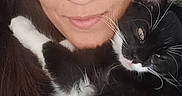 Luna joined the competition — help win amazing prizes! affection, animal, black_and_white_cat, cat, close_up, companion, cozy, cute, eyewear, face, furry, glasses, human, indoor, pet, portrait, relaxed, snuggling, whiskers, woman