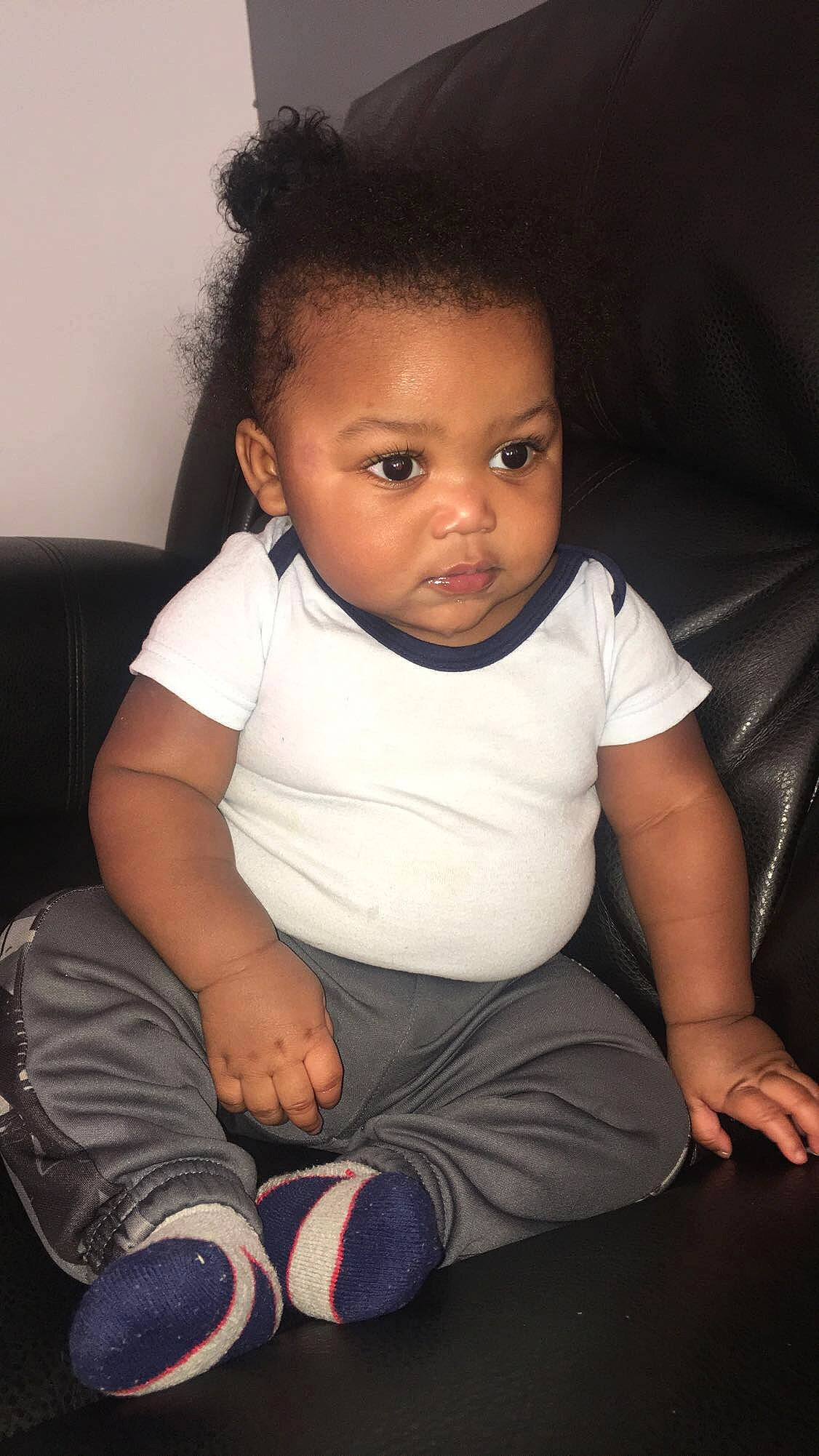 Donnie joined the competition — help win amazing prizes! arm, baby, black_hair, cheek, child, eye, face, forehead, head, leg, lip, nose, person, sitting, skin, smile, toddler