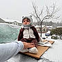 Gian joined the competition — help win amazing prizes! baby, child, snow, winter, car, cardboard, hand, coat, hood, knit_hat, outdoor, tree, house, snowfall, cold, frozen, person, clothing, footwear, blanket