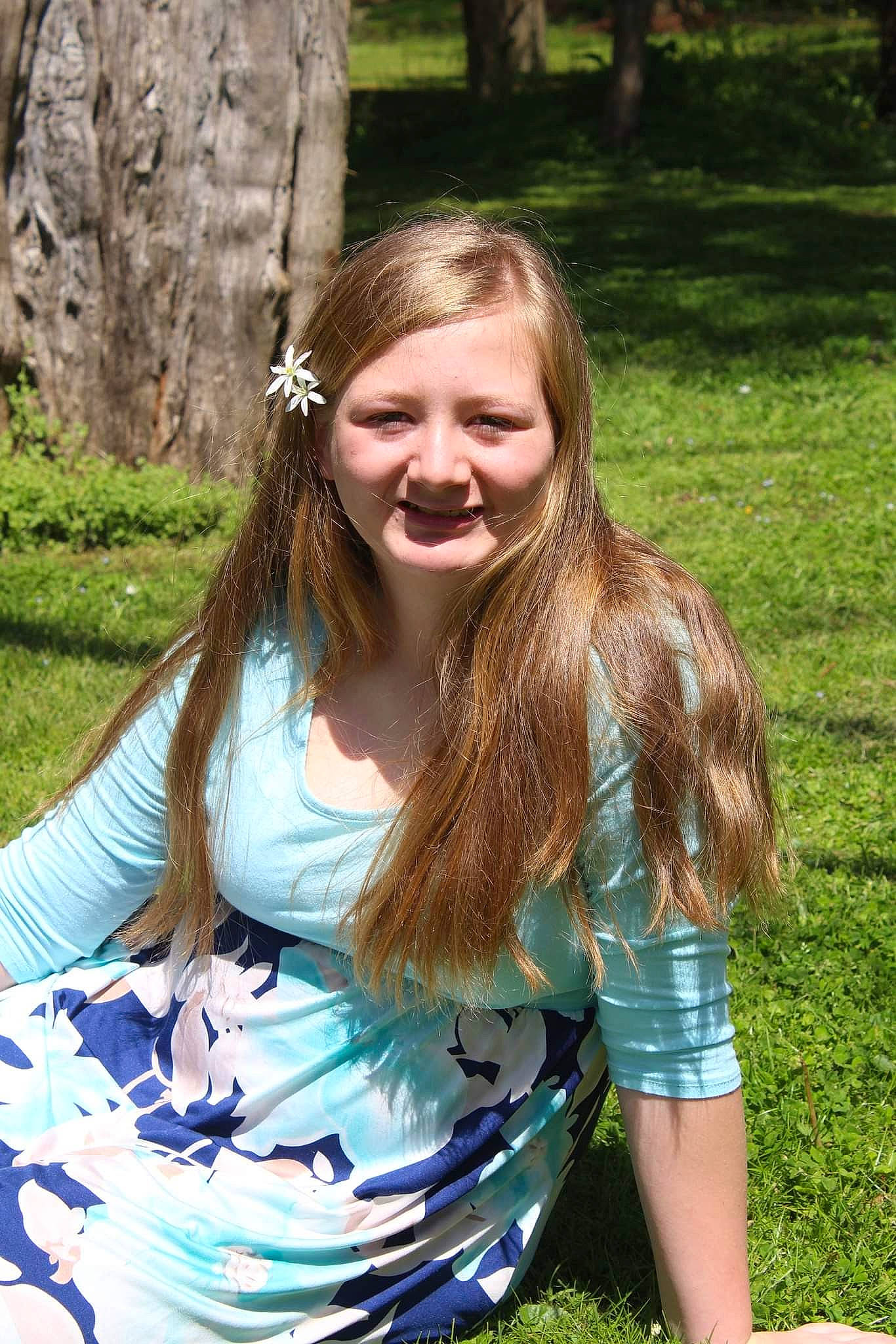 Alissa is registered to the contest to win money with this photo: beauty, blond, botany, brown_hair, dress, facial_expression, fun, grass, happy, joy, leaf, leisure, long_hair, meadow, people_in_nature, person, plant, recreation, smile, summer
