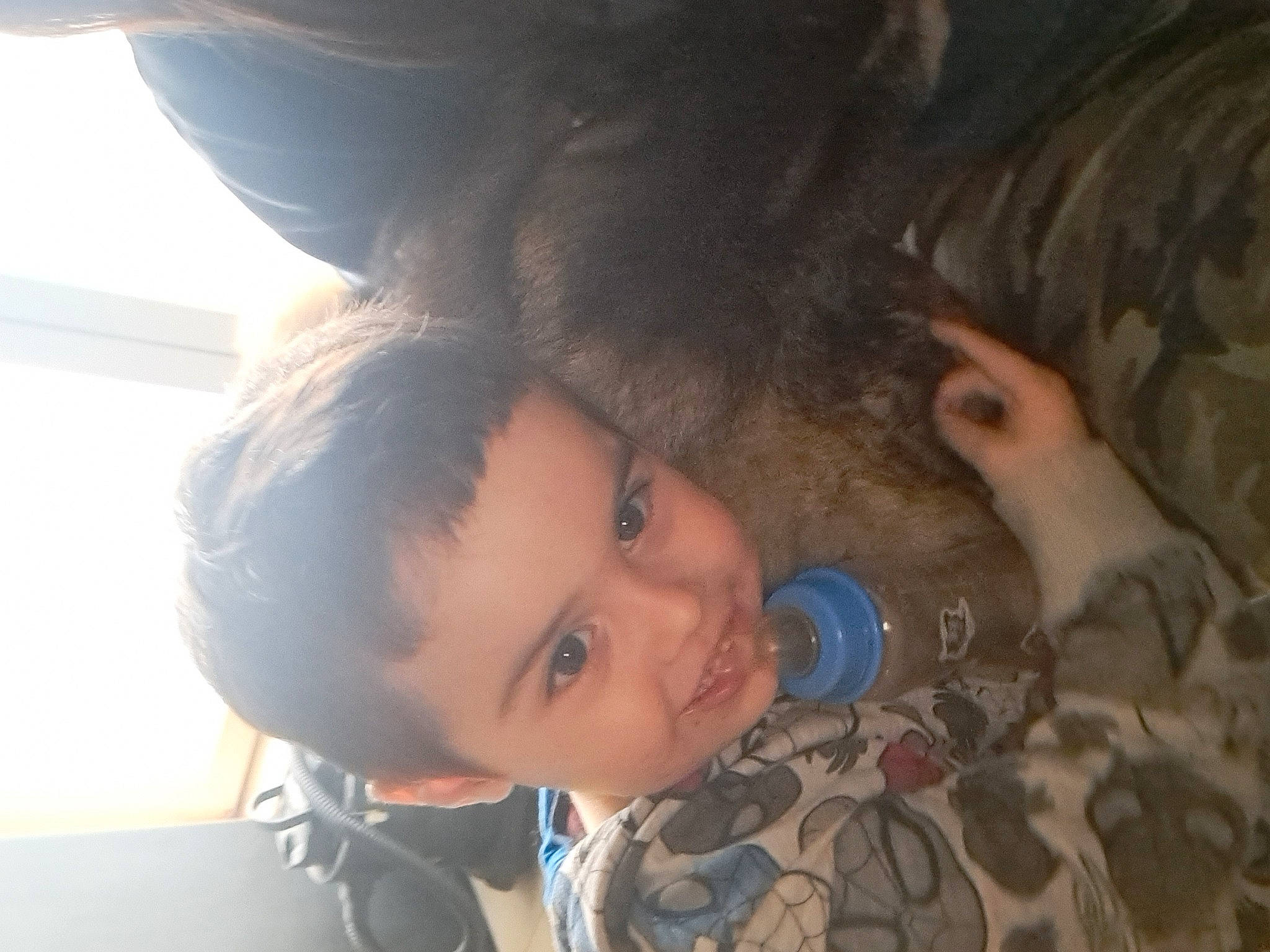 Elijah a rejoint le concours — aidez-le/la à gagner de superbes lots ! black_hair, child, ear, electric_blue, eyelash, eyewear, fun, fur, gesture, happy, joy, military_camouflage, nose, person, toddler, tree