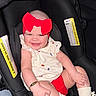 Alanna Salcedo joined the competition — help win amazing prizes! baby, infant, child, smiling, happy, car_seat, red_bow, headband, baby_clothing, white_outfit, red_shorts, socks, bracelet, portrait, seated, indoors, vehicle, safety_labels, close_up, flash_photography