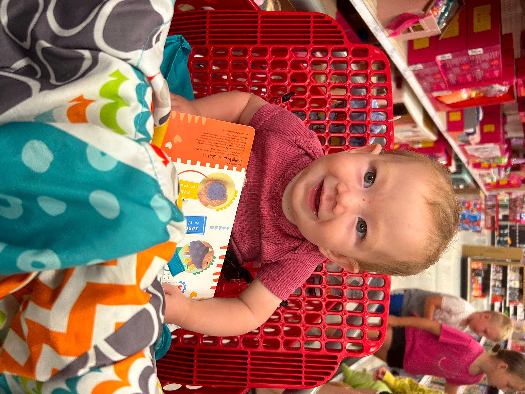 Kimberley joined the competition — help win amazing prizes! baby, baby_products, baby_toddler_clothing, beauty, cheek, child, customer, event, fun, happy, joy, linens, orange, pattern, person, play, retail, room, shelf, smile