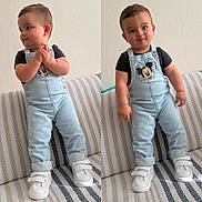 Alperen Yüceal participe au concours pour gagner de l'argent avec cette photo : baby, black_tshirt, casual_clothing, child, cute, denim_overalls, footwear, furniture, happy, indoor, light, mickey_mouse, posing, smiling, striped_couch, toddler, two_shots, wall, white_sneakers, young_child