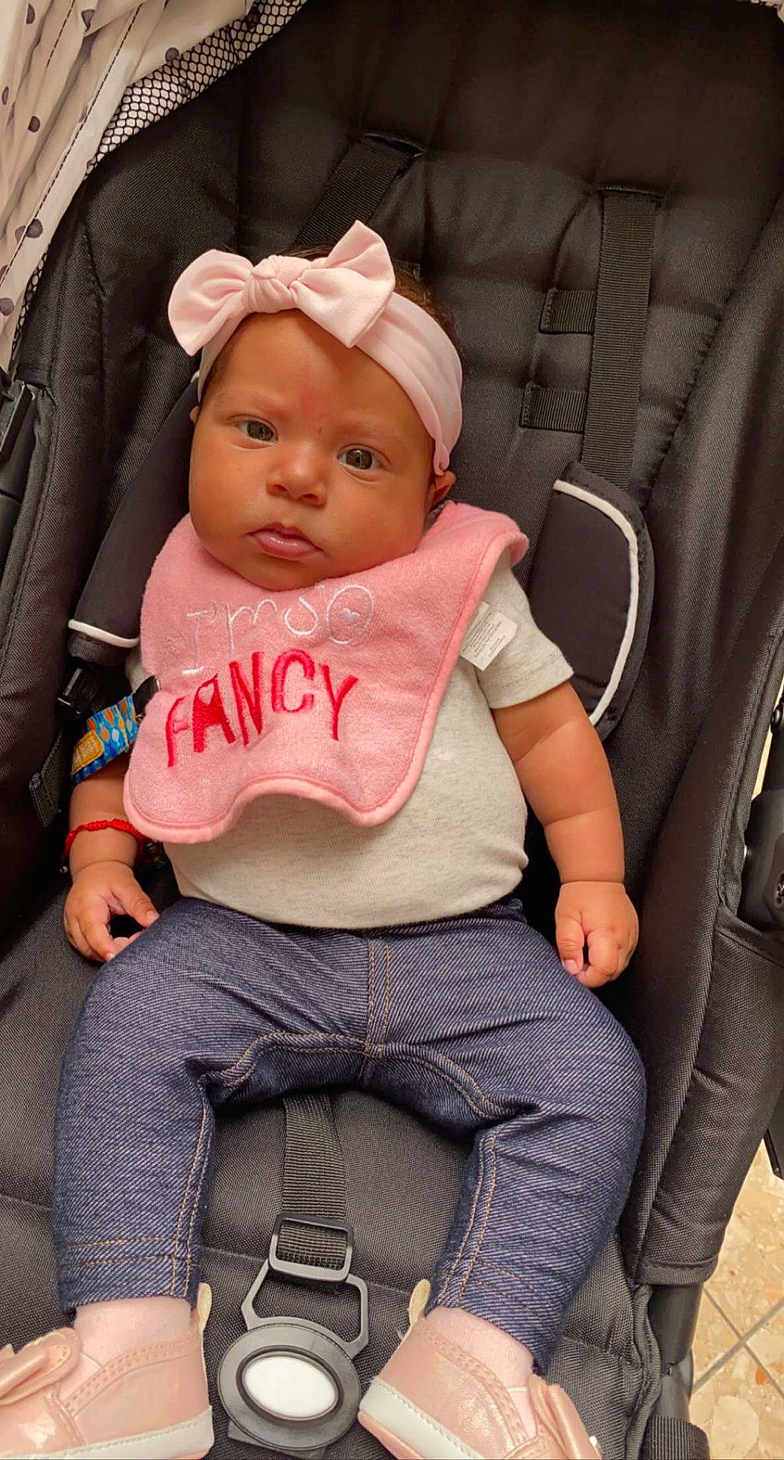 Katalina joined the competition — help win amazing prizes! baby, baby_carriage, baby_products, baby_toddler_clothing, car_seat, chair, cheek, child, comfort, fashion_accessory, headwear, knee, lap, person, pink, sitting, skin, sleeve, textile, thigh