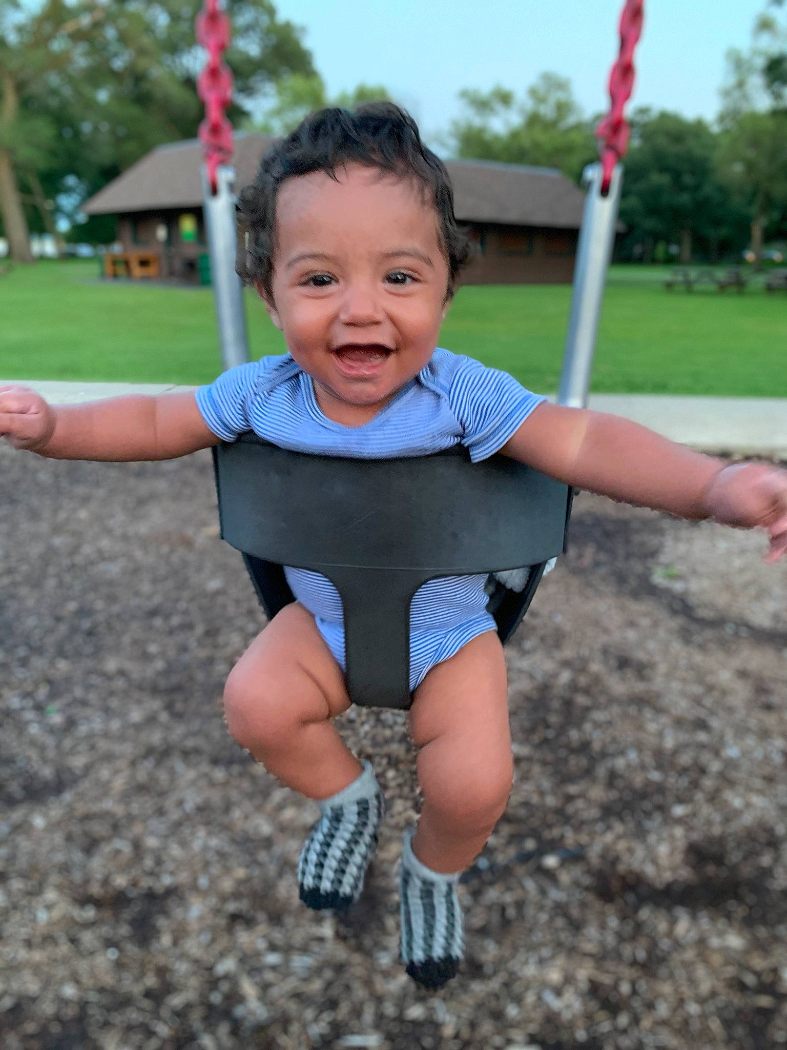 Kelvin joined the competition — help win amazing prizes! child, city, fun, happy, human_settlement, joy, leisure, outdoor_play_equipment, person, play, playground, public_space, recreation, smile, swing, toddler