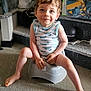 barefoot, blue_eyes, candid, carpet, child, clothing_bin, curly_hair, cute, granite_step, happy, home, indoor, person, plastic_potty, potty, sleeveless_shirt, smiling, toddler, whale_pattern, young_child