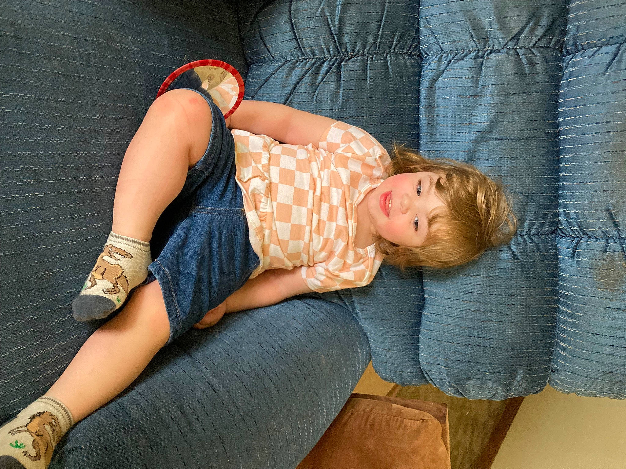 Isabella joined the competition — help win amazing prizes! baby_toddler_clothing, comfort, couch, denim, elbow, flash_photography, flooring, foot, hat, human_leg, joint, joy, knee, leg, pattern, person, sunglasses, thigh, toddler, tree