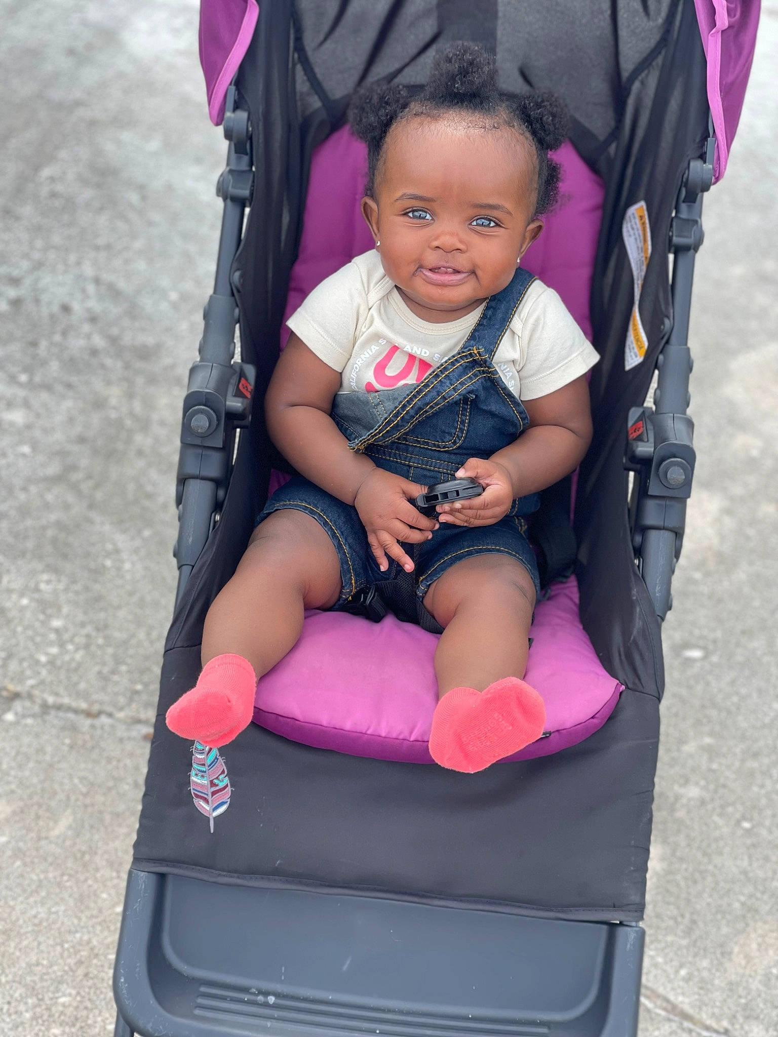 Jourdyn joined the competition — help win amazing prizes! baby, baby_toddler_clothing, black, child, comfort, eye, face, facial_expression, head, magenta, material_property, person, photograph, pink, product, purple, red, smile, toddler, violet